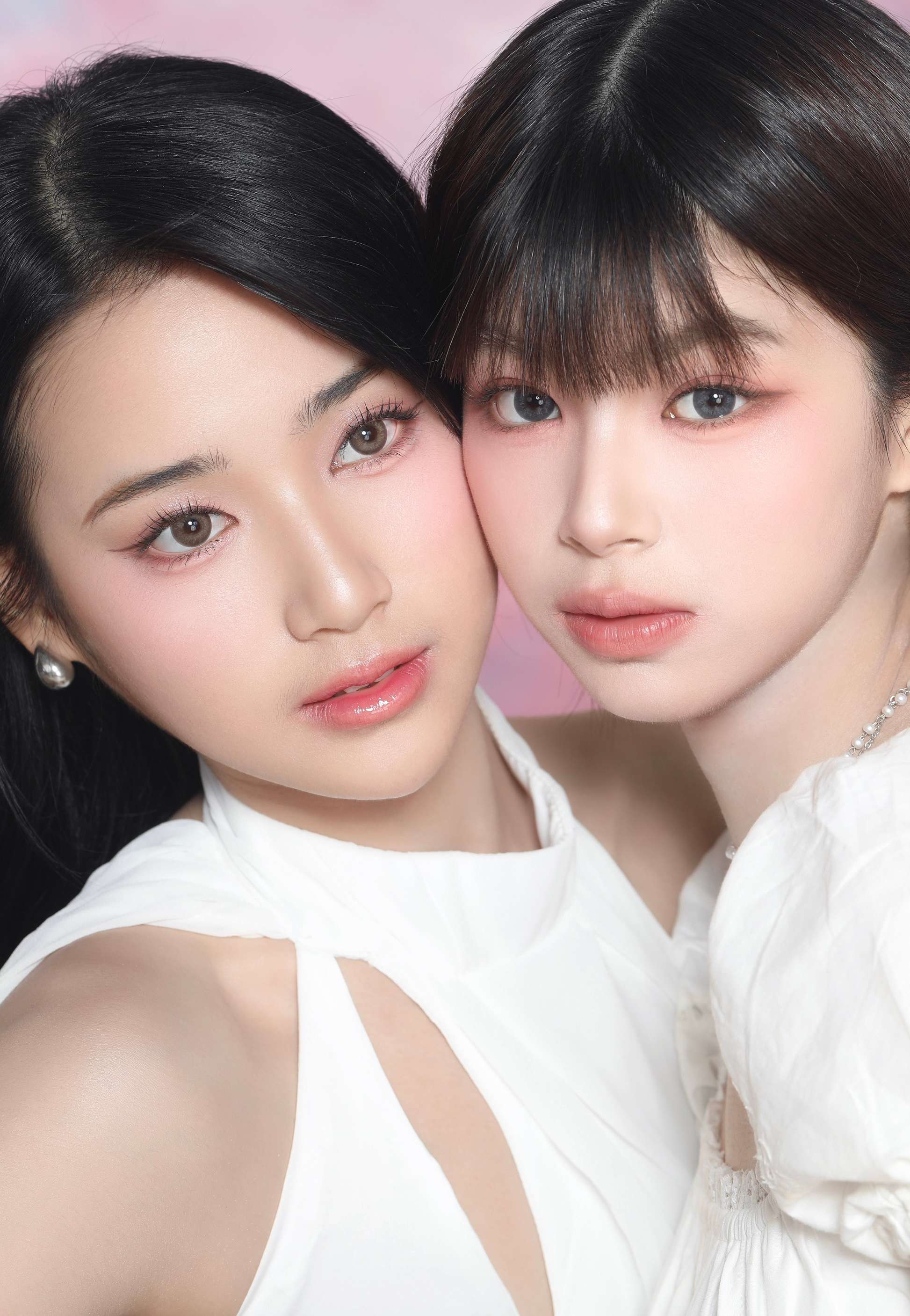 Two KORALENS models wearing contrasting shades