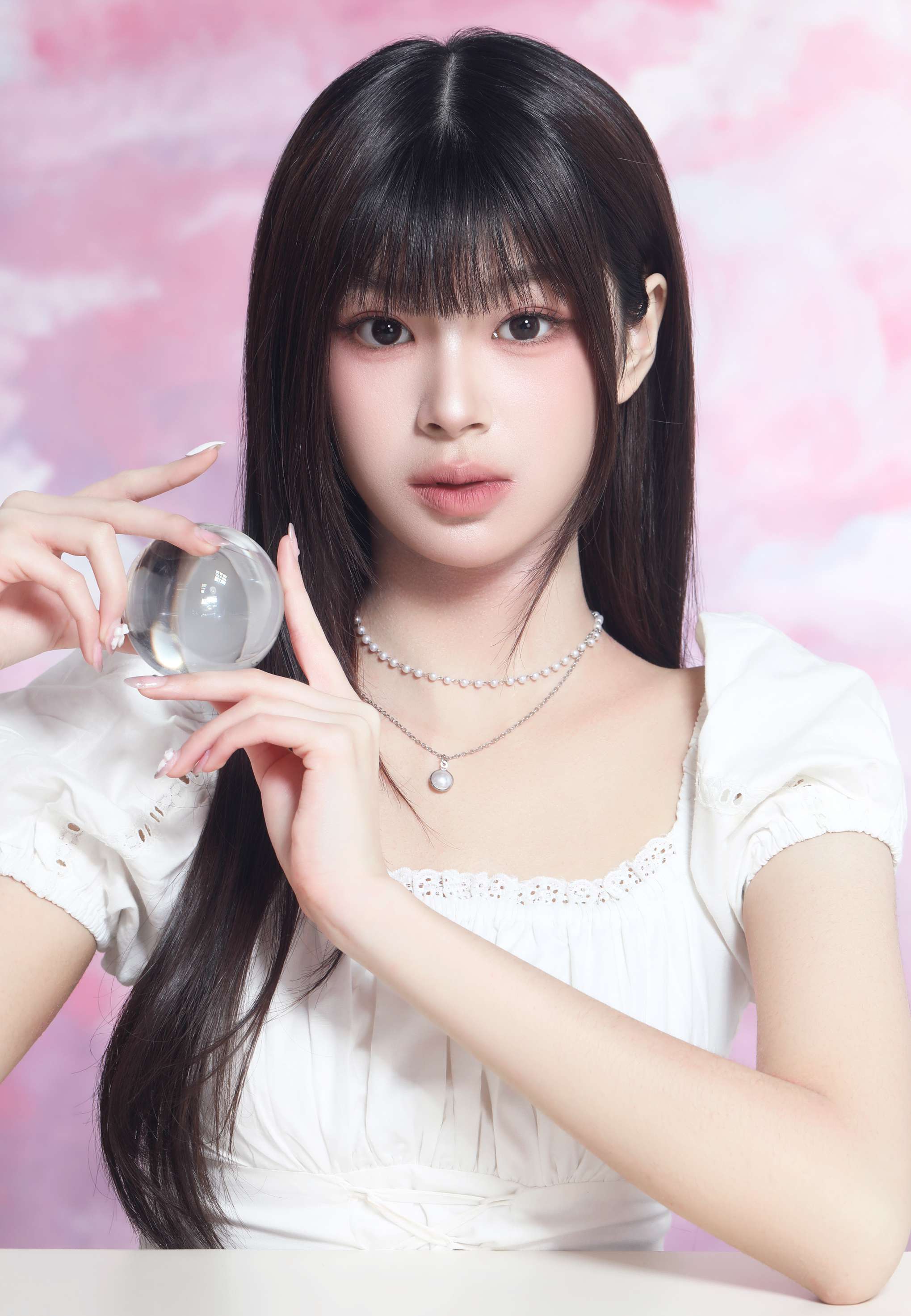 KORALENS model presenting the soft, modern lens aesthetic